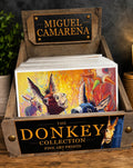 Miguel Camarena Donkey Collection tabletop retail display with packaged 11 x 14 fine art donkey prints